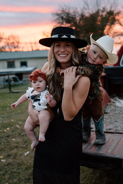western family posing on a farm 