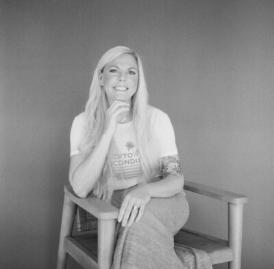 Kristen looking at the camera in black and white