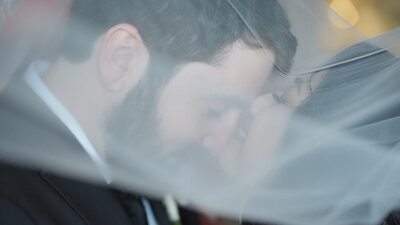 bride and groom kissing
