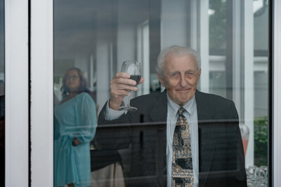 A bride toasting with her wedding party