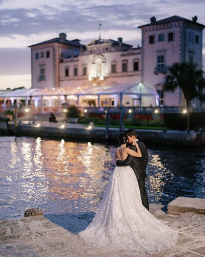 South Florida Bride and Groom overlooking the water at sunset
