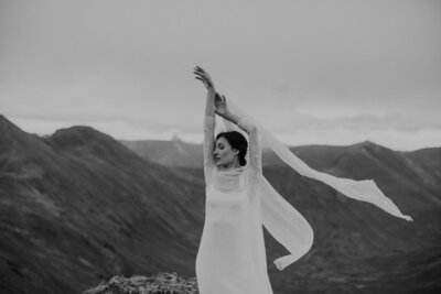 Bride dances on a mountain top