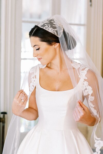 Bride wearing elegant veil