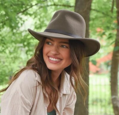 custom-cowboy-hat-woman-smiling-headwest-outdoor-event