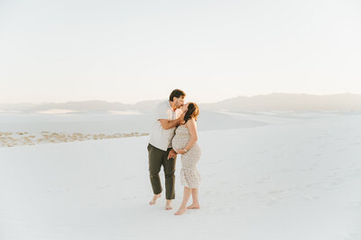 couple walking away on bridge