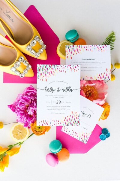 Fun invitations with confetti and bright colors