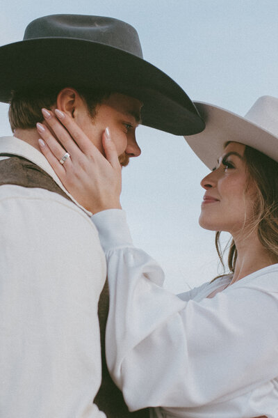 Emotional moment between newlyweds during Alberta elopement