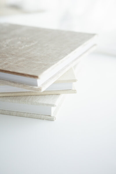Photo of heirloom album samples available with newborn photographer One Good Shot Photography located in Fresno, CA