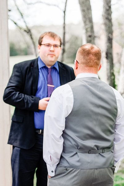 Pat chatting with groom before his first look with his fiance