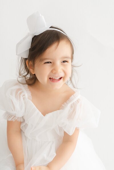 kid smiling in photography studio boston ma​