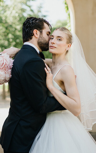 Bride and groom photographed in the vast open fields at the bride's family farm property outside of Philadelphia, PA.