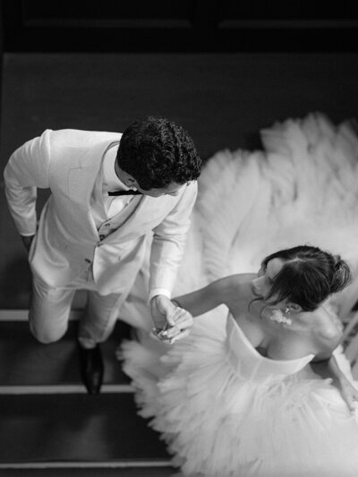 Bride and groom walk up memorial steps at their DC wedding