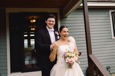 Bride and groom smiling before their wedding ceremony