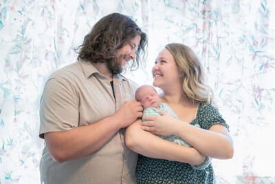 Thistle and Bloom Photography captures the joy of new parenthood in during this Lifestyle Newborn photography shoot in Shoreline Washington