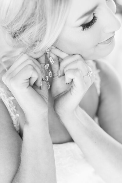 Bride looking at her wedding dress