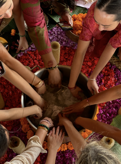Group of Woman at a colorful  workshop working together.