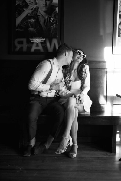 a man and woman kissing in providence rhode island for their engagement photography session