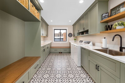 Bathroom design with frameless cabinetry, custom vanity, and contemporary tile selections.