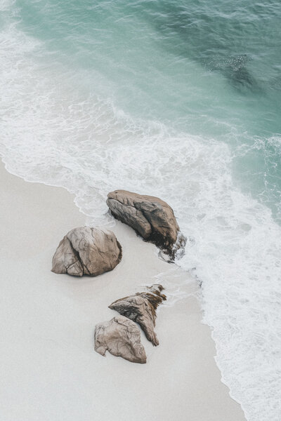 Coastal scene with smooth rocks and gentle waves