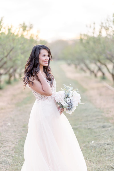 Beautiful bride outside with fllowers