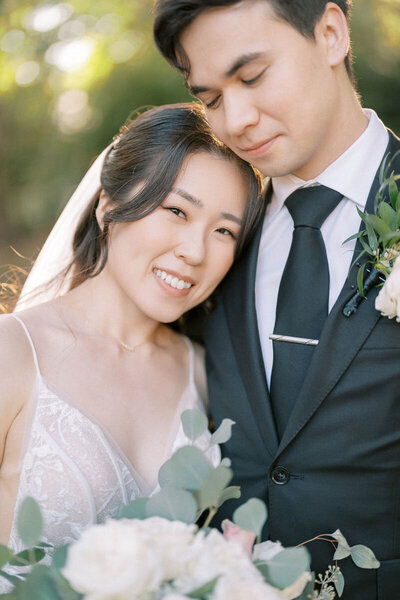 Candid moment of a couple on their wedding day at Old Mill in Toronto, captured by Toronto wedding photographer Alexandra Nadtochiy