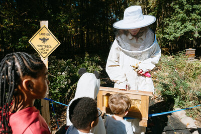 Branding photo of a beekeeper working in Westchester, New York