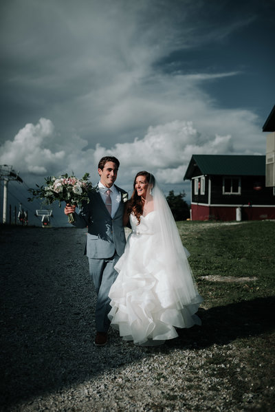 couple on top of the gondola ride at stratton mountain wedding vt