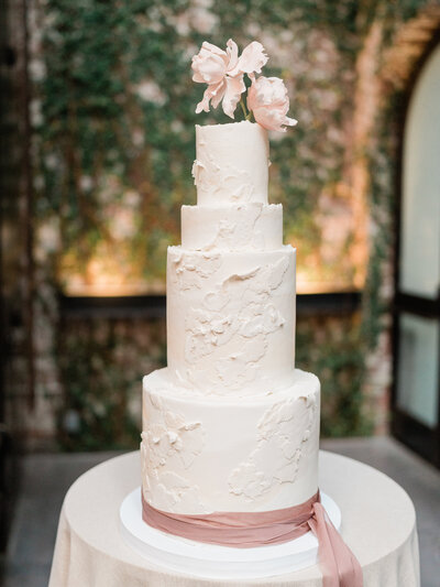 Nine cakes wedding cake