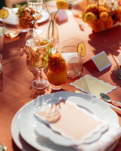 Palm Springs wedding table with vibrant colorful florals, designed by Snapdragon Bloom Bar.