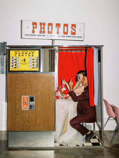 Arizona Elopement Couple in a photobooth.