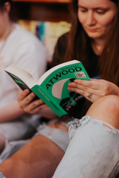 Close up of KP reading a book