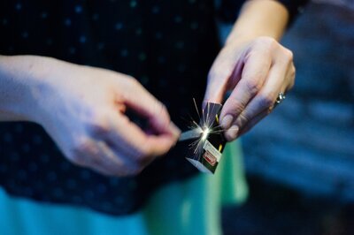 woman striking a match