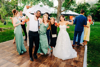 Bride with friends on dance floor at Shades of Green Events in Helena, MT