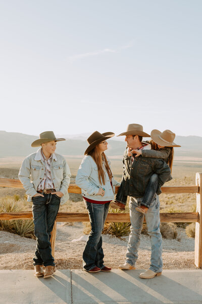 Las Vegas desert Cowboy country candid natural fun family photo shoot with kids, christmas holiday card photo shoot, Nevada, LV, Vegas portraits photographer, young families, things to do in Las Vegas, photography at Red Rock Canyon, sunset, sunrise