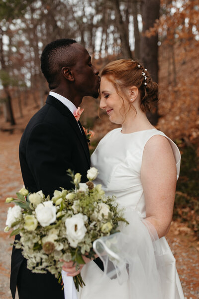 bride and groom kissing