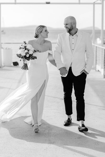 Bride & groom sharing a private moment at their tropical queensland wedding.