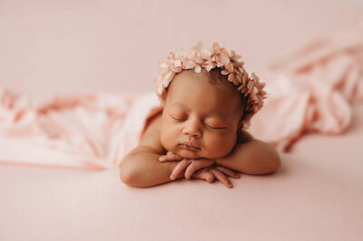 Newborn baby posed for Newborn Photos in Asheville.
