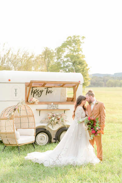 Bride and groom embrace outside at Rock Island Lake Club wedding