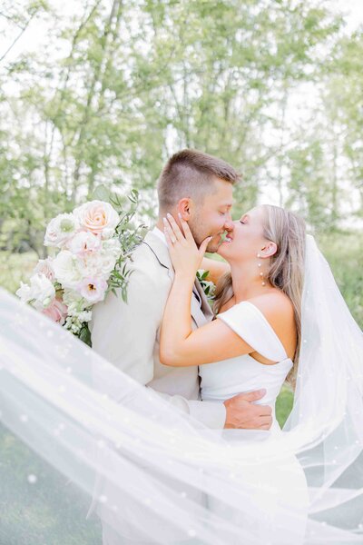 Bride embracing her groom