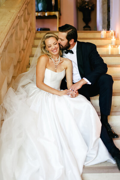 groom-holding-bride-at-luxury-destination-wedding-in-port-grimaud