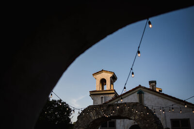 tower with string lights at sunset