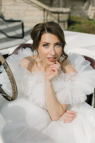 Fashion-forward bridal portrait with off-the-shoulder gown – modern Colorado bride