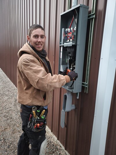 Dove Electric electrician in Albuquerque installing electricity in shop