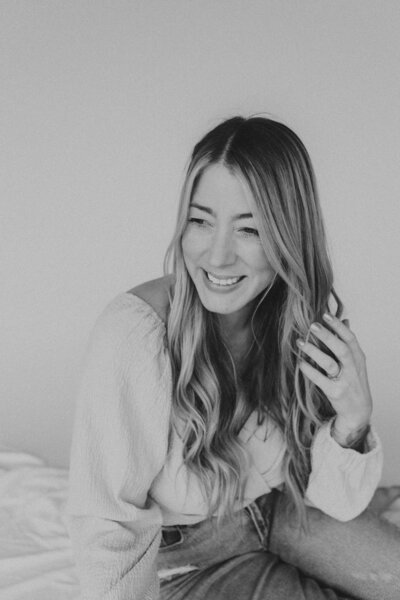 photographer holding camera on beach