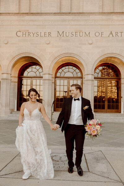 Bride and Groom share a kiss in front of Historic Jasmine venue