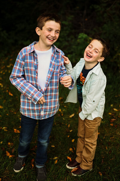 Two brothers laughing as they hang out together