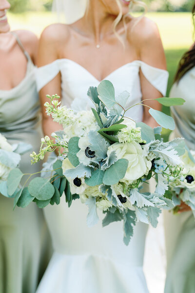 Classic florals for the bride's bouquet on her wedding day at Hewitt Oaks in Bluffton, South Carolina.