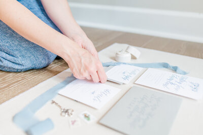 creating a wedding invitation flat lay