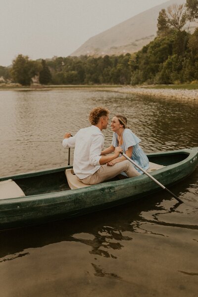 Photo of a couple sitting in a canoe