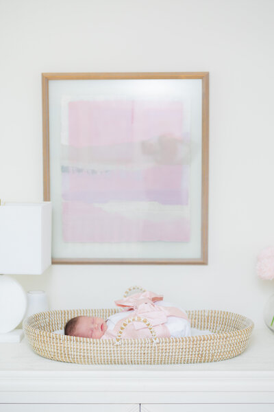 Baby laying down during newborn photo session Birmingham AL